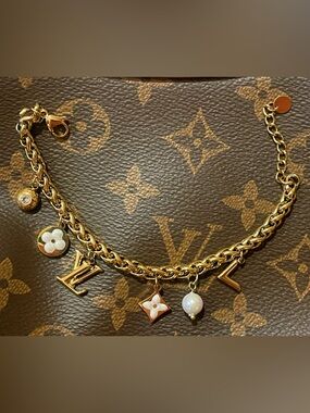 Monogram logo gold charm bracelet to match your bag or purse so so cute 🔥🔥💕